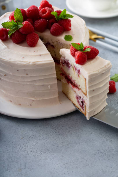 istock Respberry cake with light mascarpone frosting and fresh berries 1350259394