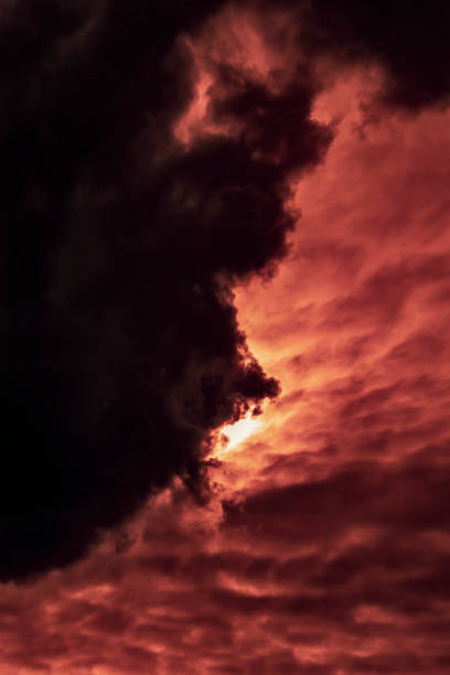 istock Vertical cloudy landscape with an overhanging thundercloud at sunset day in autumn. 1350260262