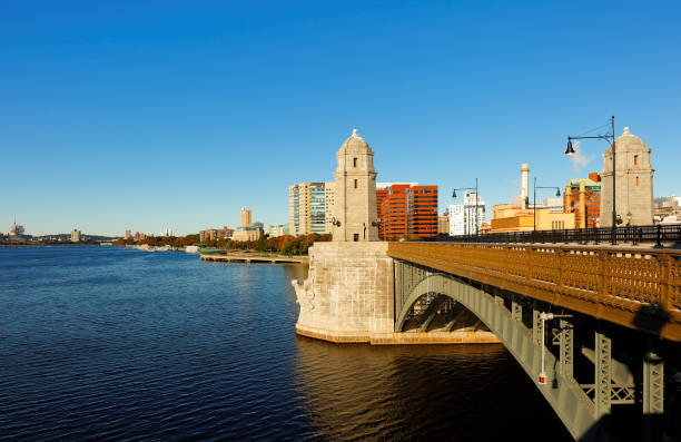 The Bridge is a steel rib arch bridge spanning the Charles River to connect Boston's Beacon Hill with the Kendall Square area of Cambridge.