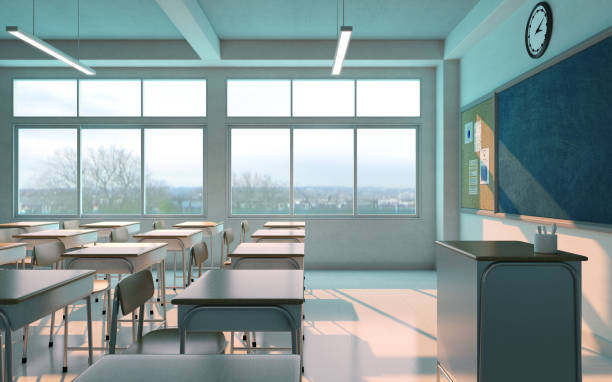 istock School classroom with chairs,desks and chalkboard without student.3d rendering 1350264576