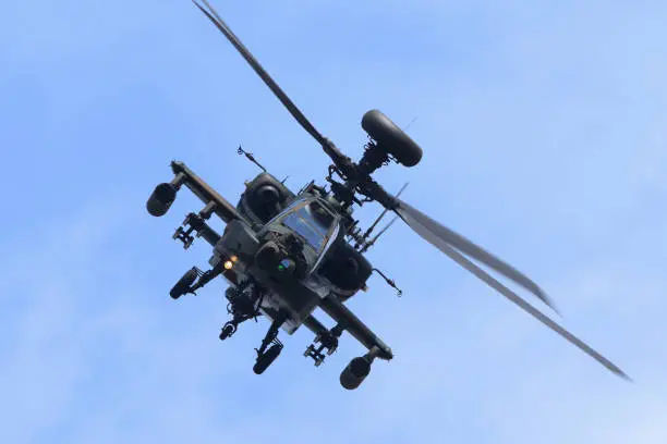 A Japanese attack helicopter performing an exhibition flight.