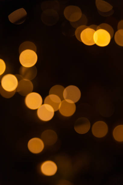 istock defocused Christmas lights on a black background 1350266950