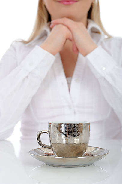 Pretty business woman drinking cup of espresso coffee. stock photo