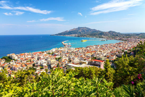Aerial panoramic cityscape view of Zakynthos city, capital of the island Zakynthos in the Ionian sea in Greece. Summer sunny day Aerial panoramic cityscape view of Zakynthos city, capital of the island Zakynthos in the Ionian sea in Greece. Summer sunny day. zakynthos stock pictures, royalty-free photos & images