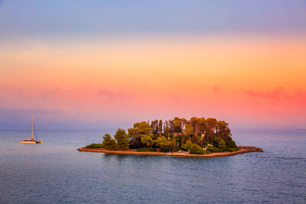Pontikonisi Mouse Island during sunset. Corfu island, Greece.