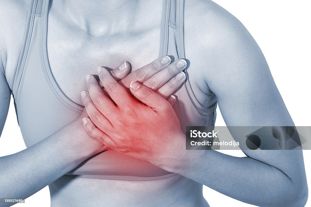 Acute pain in a woman chest Acute pain in a woman chest. Isolation on a white background Adult Stock Photo