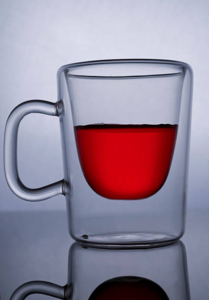 istock Transparent glass coffee cup with red pomegranate juice 1350281777