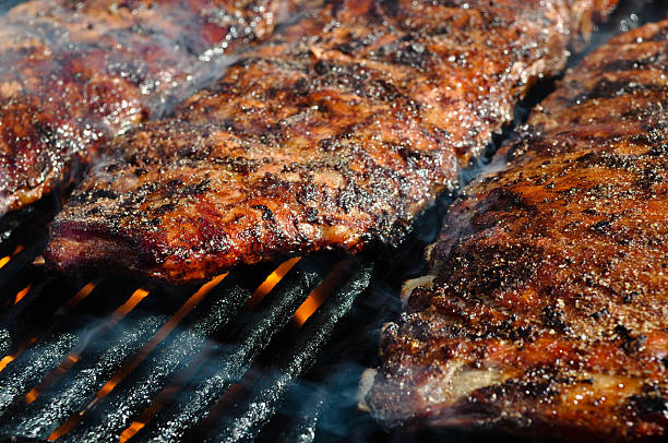 istock Pork barbecue ribs on the grill 135028773