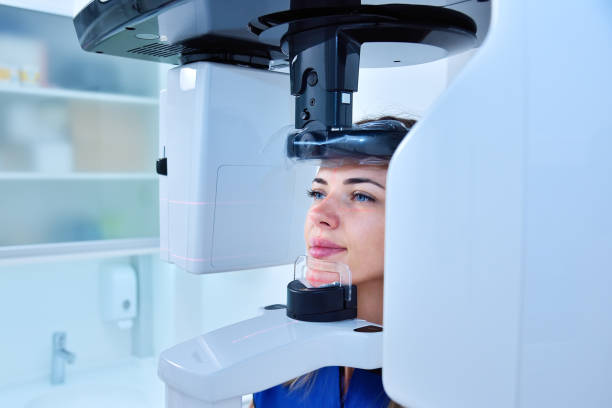 istock Young woman patient make a dental computer tomograph. 1350287933