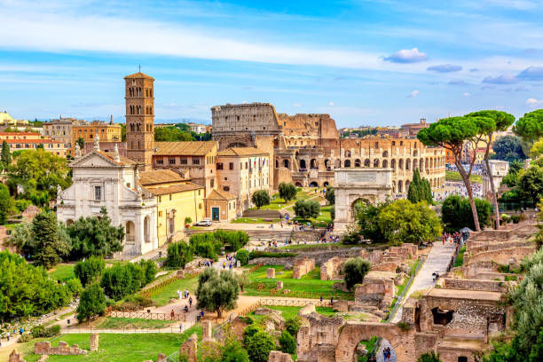 aerial panoramic cityscape view of the roman forum and roman colosseum in rome, italy. world famous landmarks in italy during summer sunny day. - het forum van rome stockfoto's en -beelden