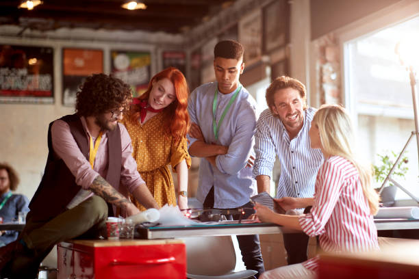 istock Group of employees projecting together 1350299684
