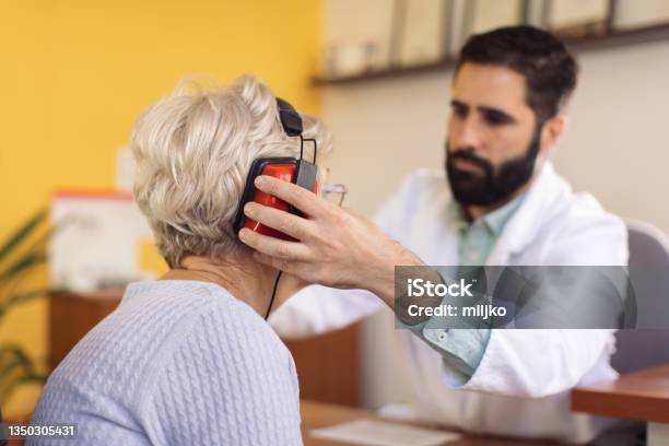 Hearing Test And Buying Hearing Aid Stock Photo - Download Image Now - Ear Exam, Hearing Test, Audiologist