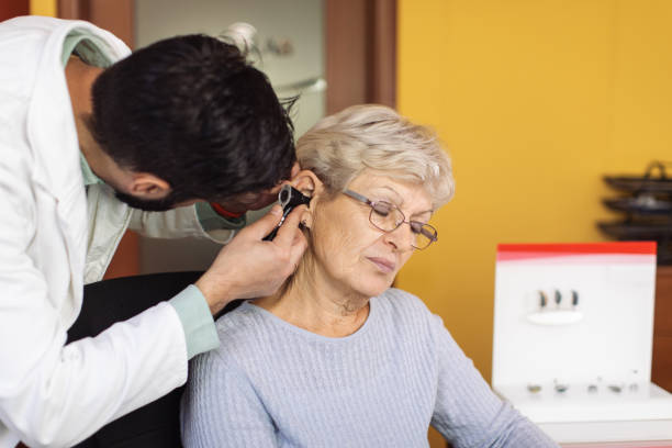 istock Hearing test and buying hearing aid 1350305463