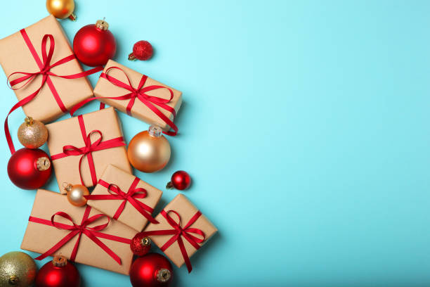 istock Christmas decorations and gifts on a colored background top view 1350311792