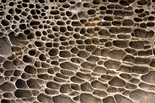 Natural background of textured, porous rock