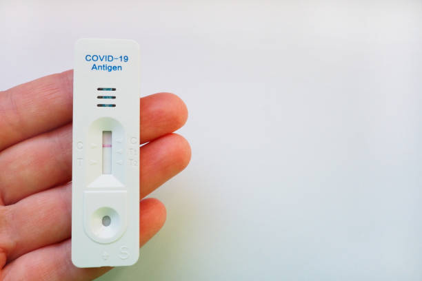 istock The test result for COVID-19 is negative, not infected, using rapid testing equipment. Test for coronavirus on the hand, white background. Copy space. Testing Concept Coronavirus Disease infection. 1350320628
