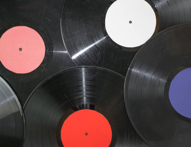 istock Old retro vinyl records musical background 1350320700
