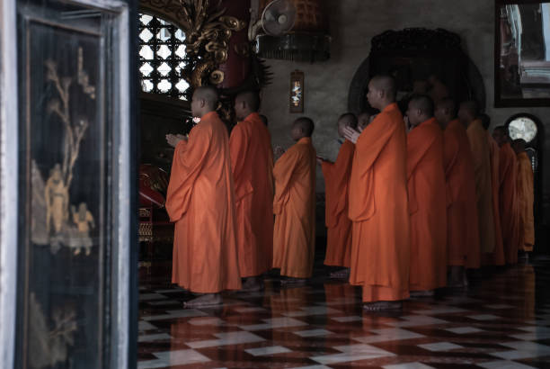 Bangkok, Thailand - 18 Aug 2019 : Chinese monks praying for buddhism worship inside Wat Bhoman Khunaram (Bhoman Khunaram Temple).