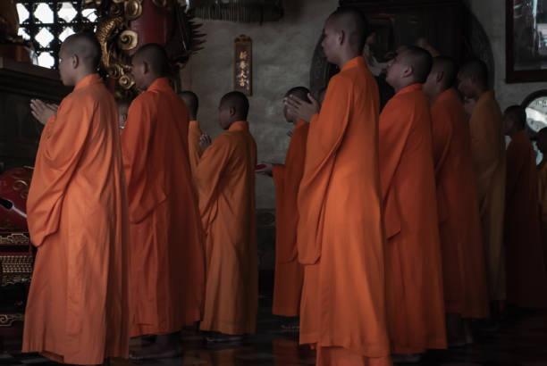Bangkok, Thailand - 18 Aug 2019 : Chinese monks praying for buddhism worship inside Wat Bhoman Khunaram (Bhoman Khunaram Temple).