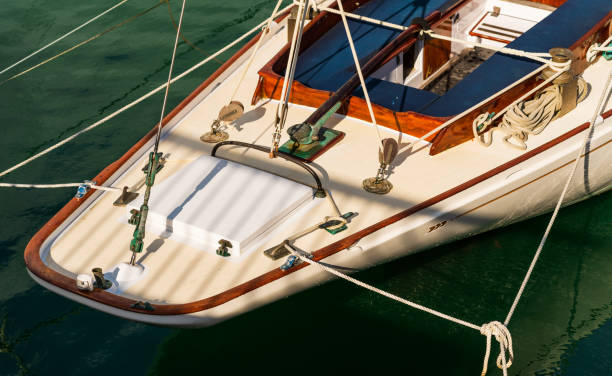 The view of a part of a ship in green colored water.