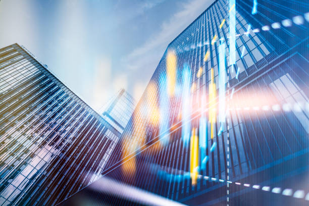 istock Multi exposure of abstract financial graph on office buildings background, forex and investment concept 1350337855