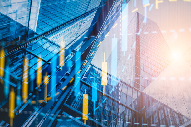 istock Multi exposure of abstract financial graph on office buildings background, forex and investment concept 1350337914