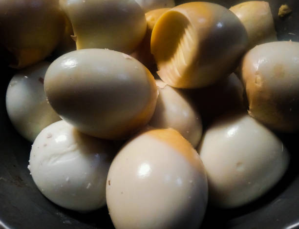 istock Boiled chicken eggs that have been peeled and arranged in piles 1350341699
