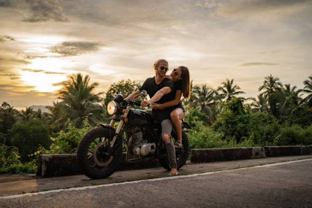 istock Couple enjoying the sunset ride 1350345239