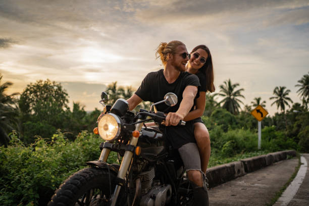 istock Couple enjoying the sunset ride 1350345245