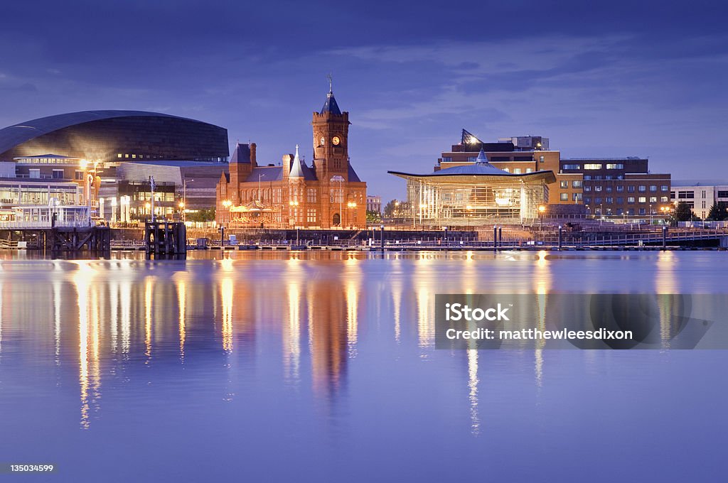 Cardiff Bay Cityscape Pretty night time illuminations of the stunning Cardiff Bay, many sights visible including the Pierhead building (1897) and National Assembly for Wales. ProPhoto RGB for precise colour reproduction. Cardiff - Wales Stock Photo