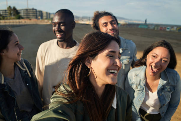 istock Multiracial happy group of friends make selfie. 1350352967