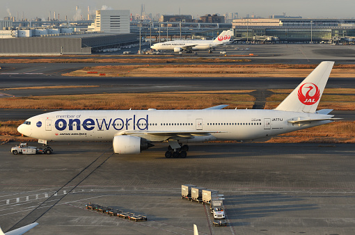 Tokyo, Japan - December 29, 2020:Japan Airlines (JAL) Oneworld livery Boeing B777-200 (JA771J) passenger plane.