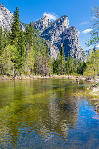 The Three Brothers reflected in the River Merced in Yosemite Valley, UNESCO World Heritage Site, California, United States of America, North America