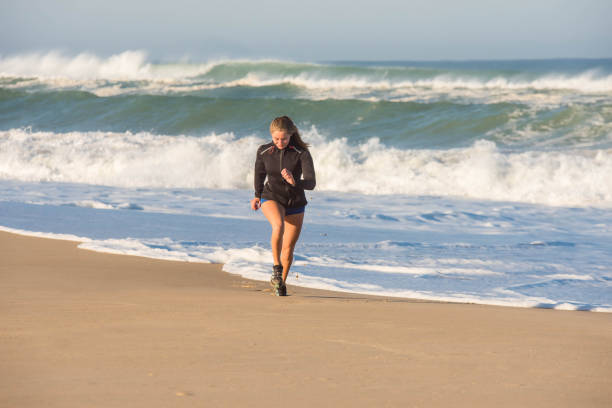 young woman jogging in sportswear