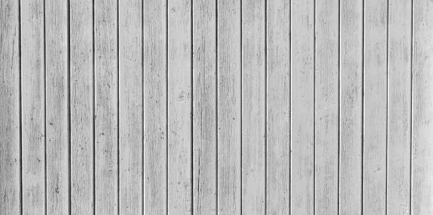 istock Weathered white wooden background texture. 1350366946