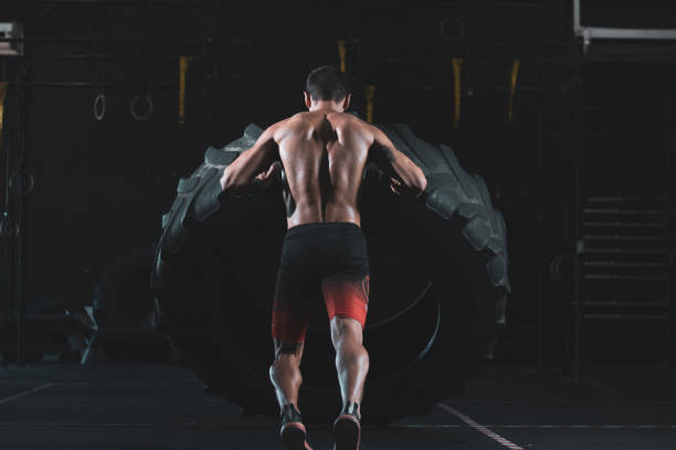 istock a 40 year old man training in a gym. 1350373696