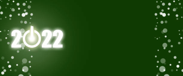 istock 2022 neon numbers. Power button. Green background. Concept for early 2022. New Year's banner. Copy Space. Place for your text. 1350376818