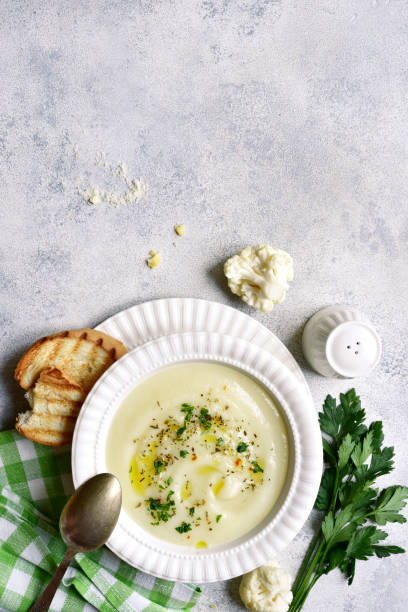 istock Cauliflower creamy soup with potatoes and cheese 1350378991