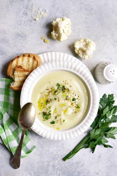 istock Cauliflower creamy soup with potatoes and cheese 1350379031