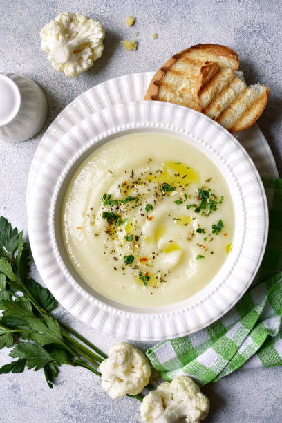 istock Cauliflower creamy soup with potatoes and cheese 1350379037