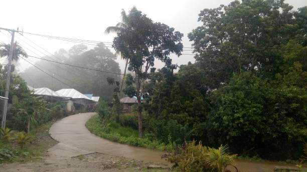 istock rural atmosphere in gorontalo when it rains. 1350380095