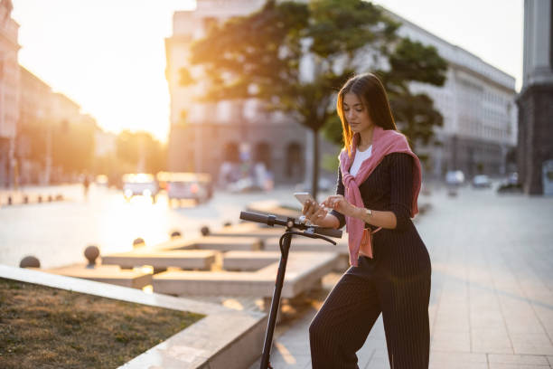 istock Pretty woman texting on phone 1350380241
