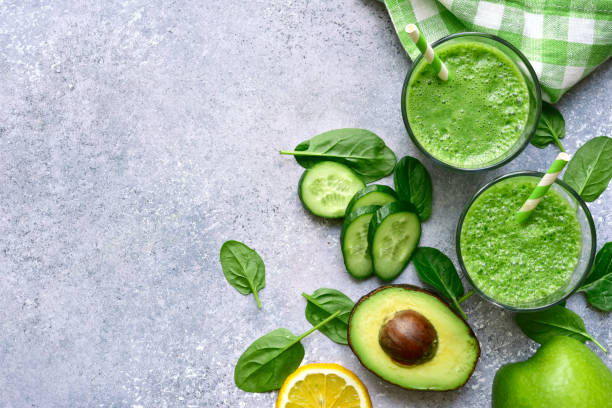 istock Detox smoothies from green vegetables ( cucumber, avocado, baby spinach and apple) 1350381272