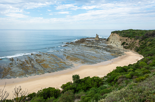 The Caves Beach and Eagles Nest rock formation in Bunurong Marine and Coastal Park in Victoria, Australia.