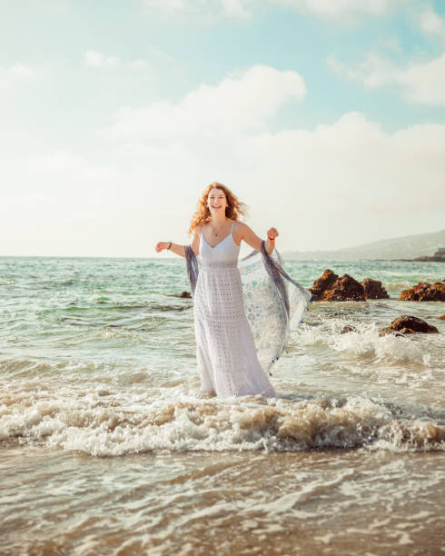 istock Girl on the beach 1350386536