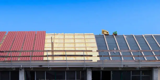 Photo of roof renovation, progression step by step of the layers, energy efficiency of the house