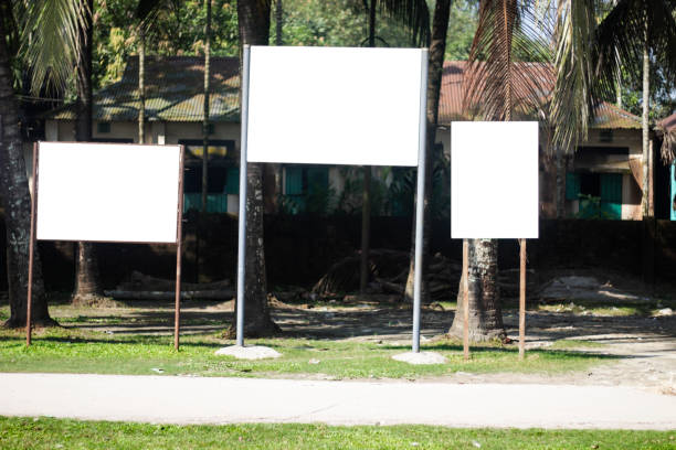 istock four white billboards blank in the open park for advertisement 1350390803