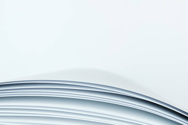 istock Sheets of white paper on white background. Abstract background. 1350393079