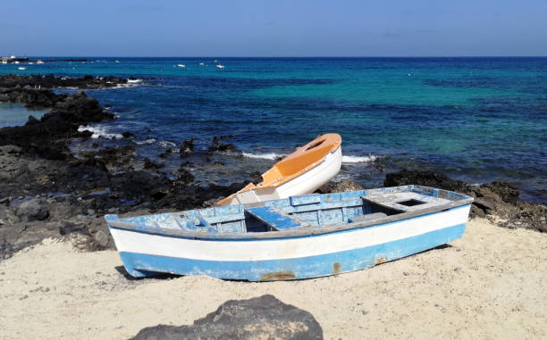 istock Little Beach with Boat 1350394197