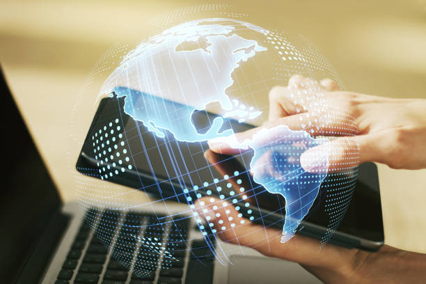 istock Double exposure of digital America map and finger clicks on a digital tablet on background, research and strategy concept 1350397871